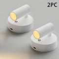Two white cylindrical lights with yellow accents on a gray background, labeled '2PC'.
