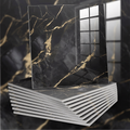 black and gold marble tiles on a black and gold marble background
